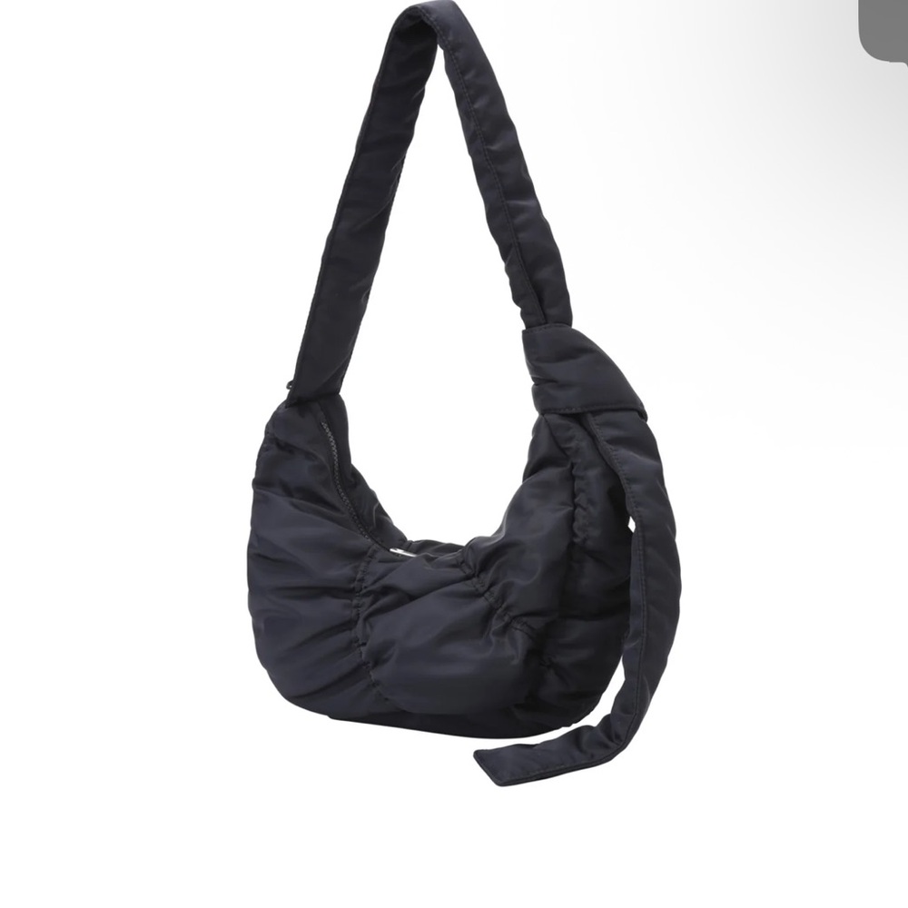 Circular Library adjustable strap bag